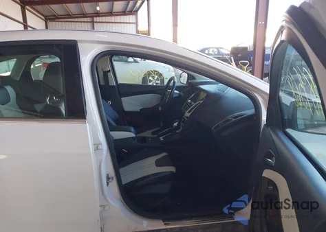 2012 Ford Focus Titanium z USA, uszkodzony, nr VIN 1FAHP3N29CL283081